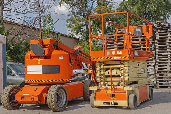 industrial forklift transporting goods in a warehouse in Apache